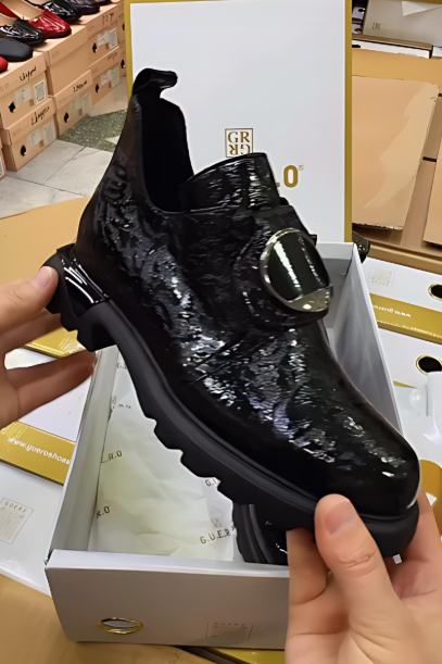 Women's black leather slip-on shoes