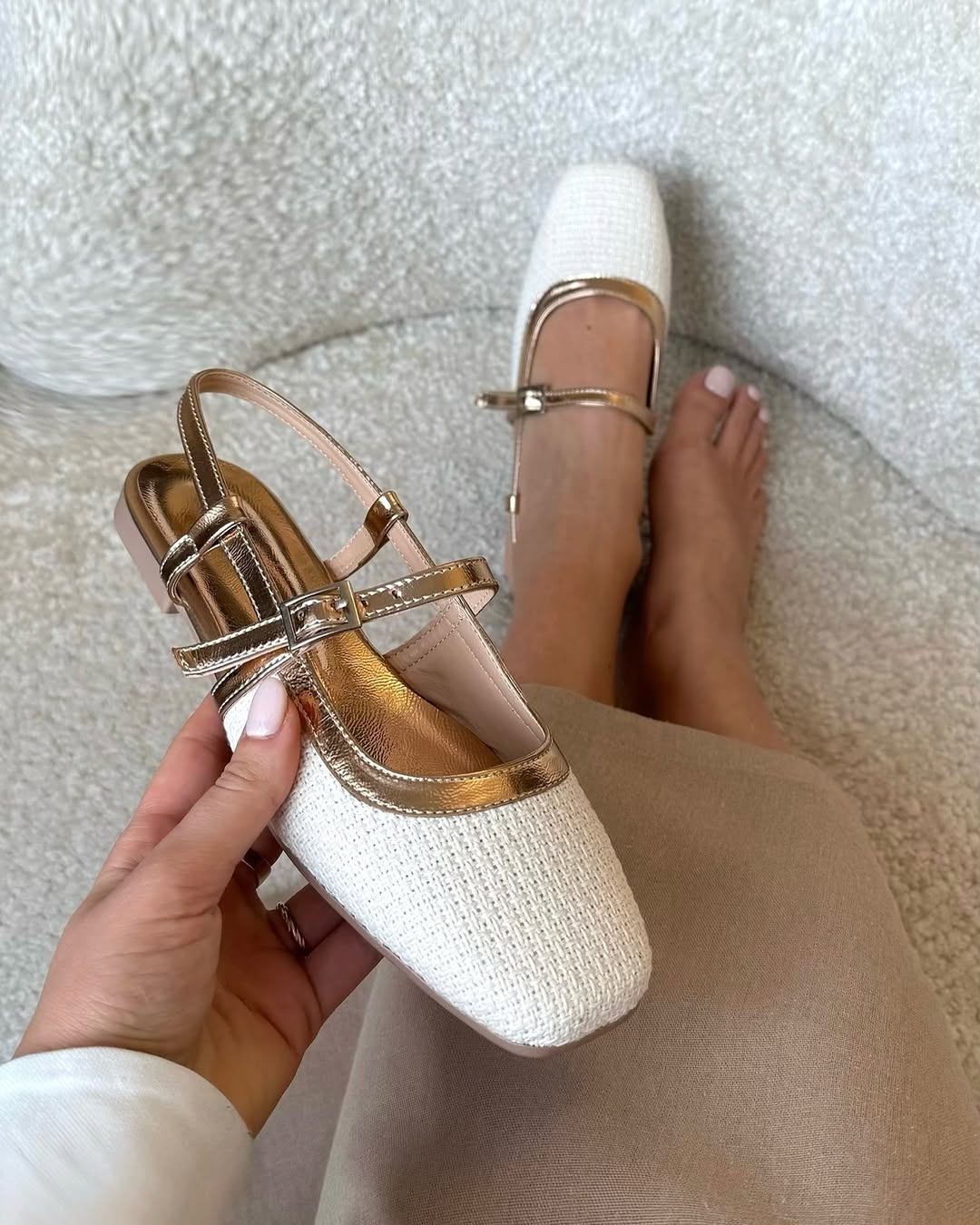 White Flat Shoes With Gold Buckle