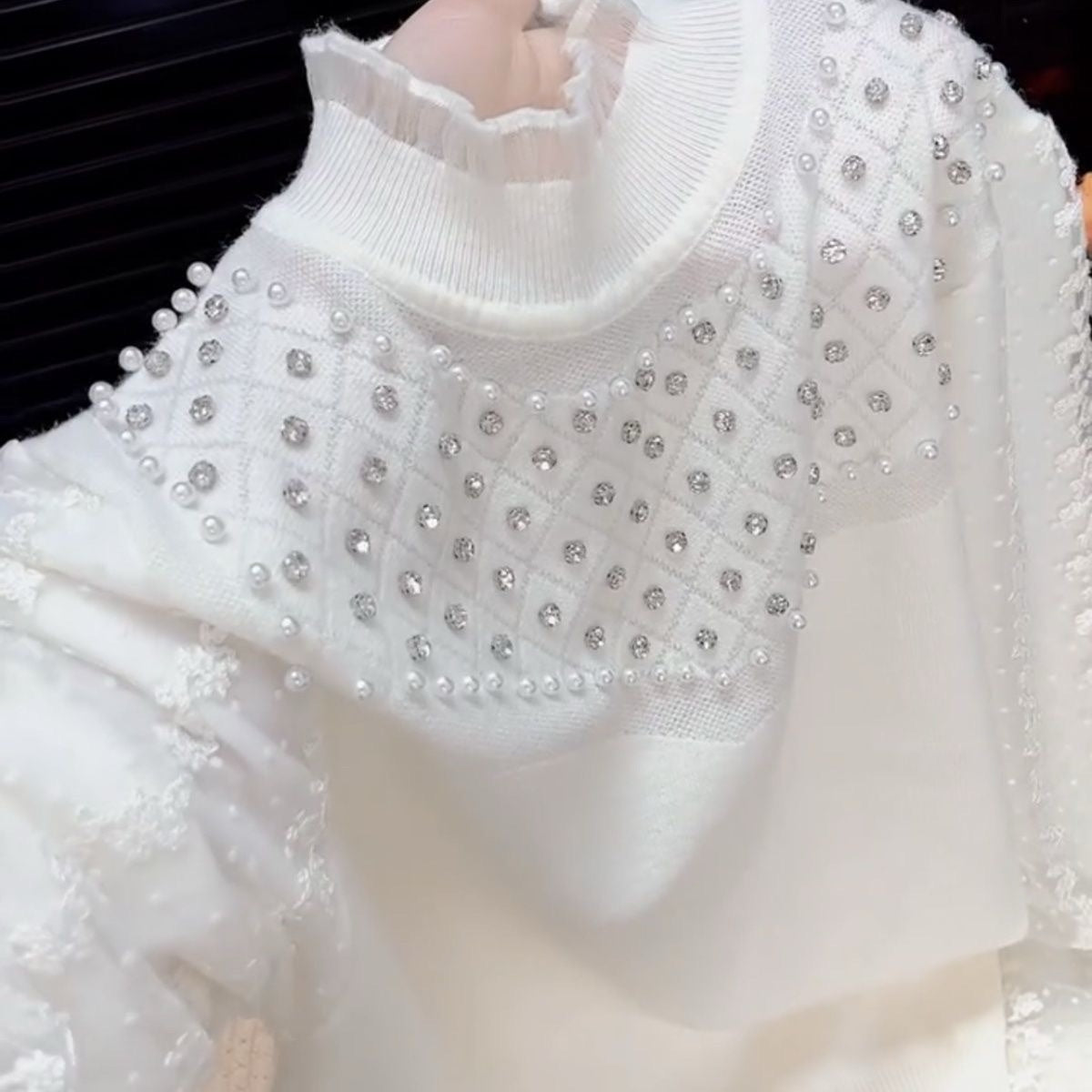 Rhinestone and pearl knit long-sleeved top